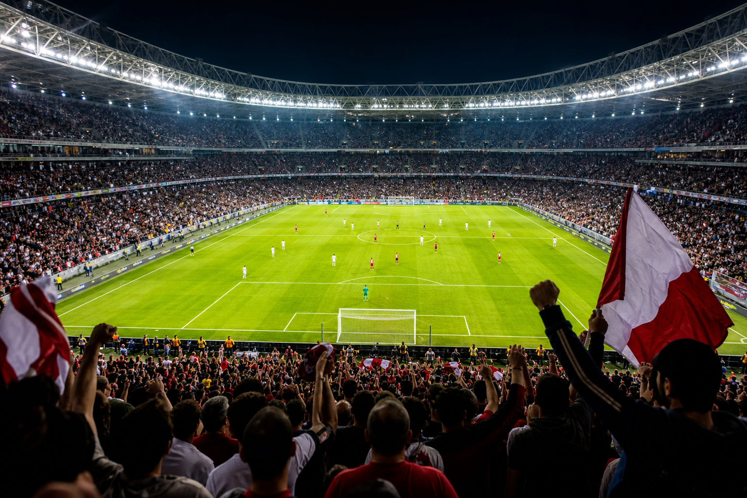 Packed football stadium under bright floodlights at night